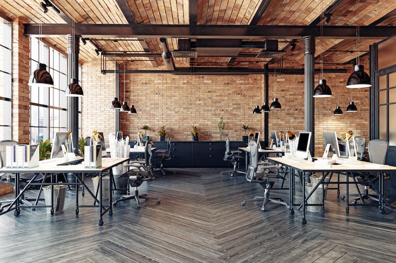 Modern office interior with wooden beams and desks