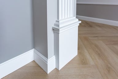 White architectural trim and gray wall corner